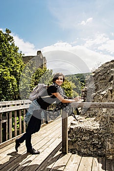 Young traveller woman posing in castle ruins of Hainburg