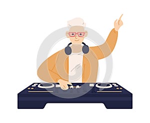 Young trendy disc jockey playing electronic dance music on dj console. Male musician mixing audio records on turntable