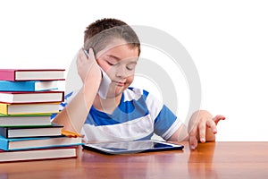 Young tween boy chatting on a mobile phone