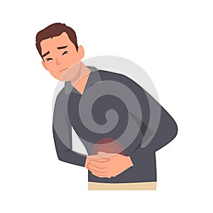 Young unhealthy man suffer from stomach ache or gastritis.