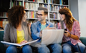 Young university students studying together. Group of multiracial friends in college