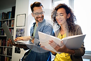 Young university students studying together. Group of multiracial friends in college