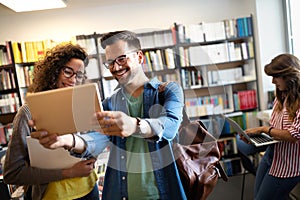 Young university students studying together. Group of multiracial friends in college