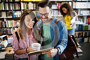 Young university students studying together. Group of multiracial friends in college