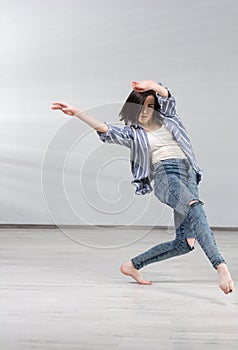 Young urban woman dancing.