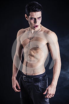 Young Vampire Man Shirtless, Gesturing to Camera