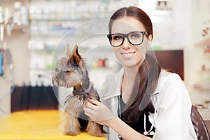 Young Veterinarian Female Doctor with Cute Dog