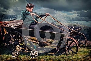 Young villager in the old cart