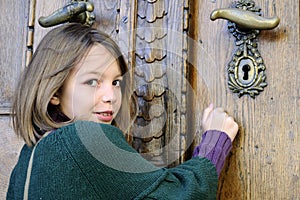 young visitor knocking on museum door