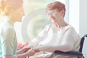 Young volunteer and elderly woman