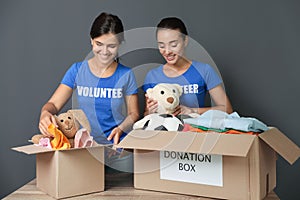 Young volunteers collecting donations at table