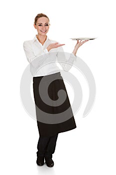 Young waitress holding tray
