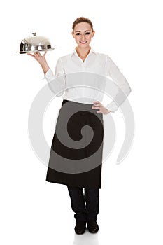Young waitress holding tray and lid