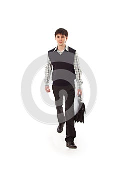 The young walking businessman isolated on a white