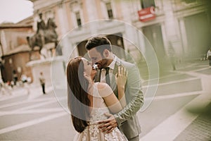 Young wedding couple on Capitoline hill in Rome