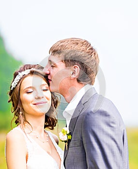 Young wedding couple enjoying romantic moments