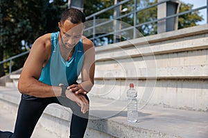 Young well-built man having a workout and looking determined