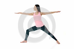 Young woman doing yoga, Warrior Pose Ã¢â¬â Virabhadrasana