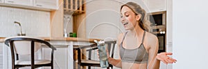 Young white woman gesturing and using laptop during yoga practice