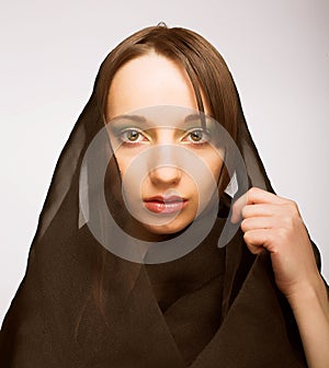 Young widow over white background