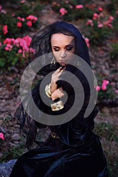 Young widow wearing black veil