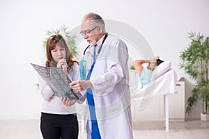 Young wife visiting sick husband in the clinic