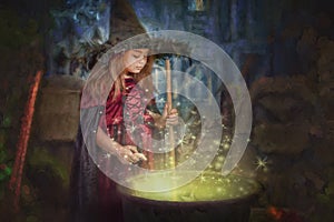 Young witch stirring cauldron