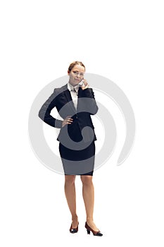 Young woman, accountant, booker in office suit isolated on white studio background