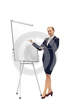 Young woman, accountant, booker in office suit isolated on white studio background