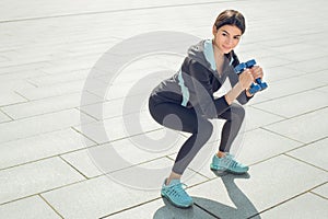 Young woman active exercise workout on street outdoor