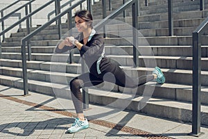 Young woman active exercise workout on street outdoor