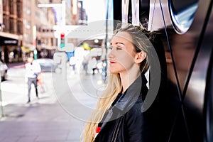 Young woman in activewear in the city