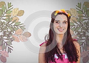 Young woman against grey background with flowers in hair and pretty flower illustrations