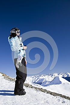 Young woman against in the mountains