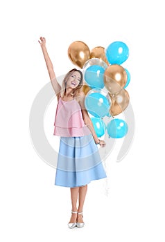 Young woman with air balloons