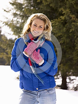 Young Woman In Alpine Snow Scene