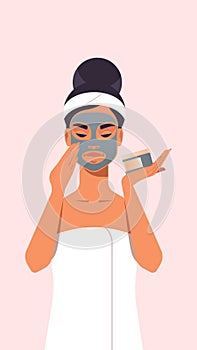 Young woman applying black face mask dressed in towel girl with clean fresh skin skincare spa relax facial treatment