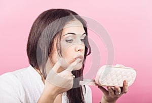 Young Woman Applying Make Up