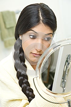 Young Woman Applying Makeup