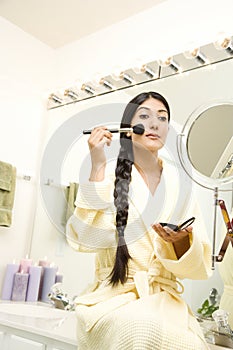 Young Woman Applying Makeup