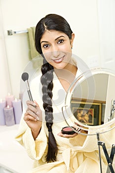Young Woman Applying Makeup
