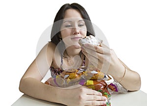 Young woman with armful of flour food product