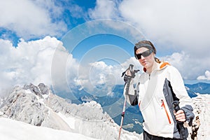 Young woman ascending a mountain