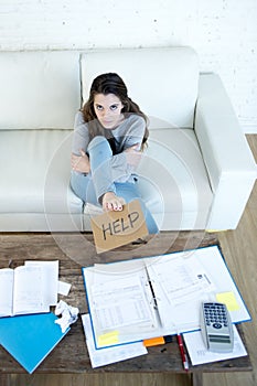 Young woman asking for help suffering stress doing domestic accounting paperwork bills