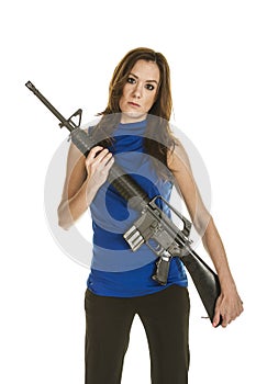Young woman with assault rifle photo