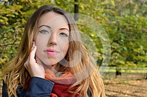 Young woman in autumn park