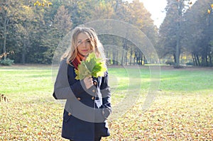 Young woman in autumn park