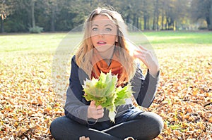 Young woman in autumn park