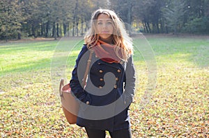 Young woman in autumn park