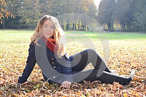 Young woman in autumn park